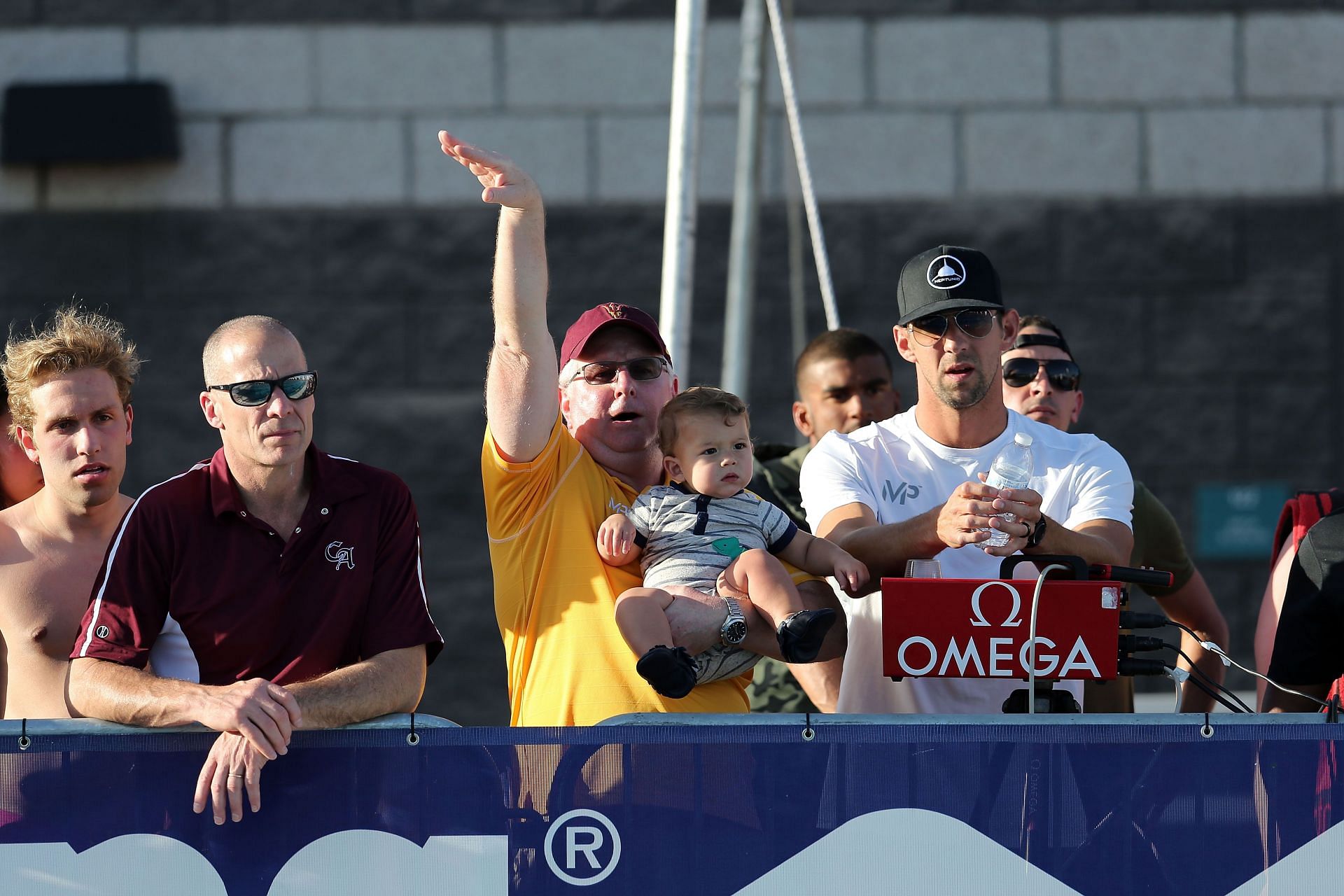 Bob Bowman, Boomer Phelps and Michael Phelps at the Arena Pro Swim Series Mesa - Day 2 - Source: Getty